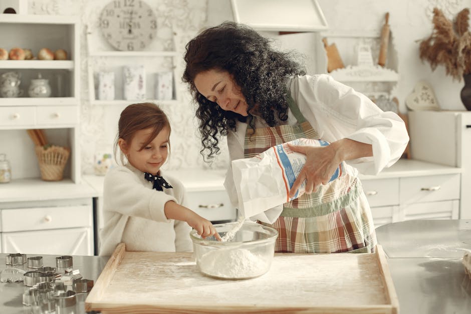A family baking peanut butter cookies together in a warm, cozy kitchen